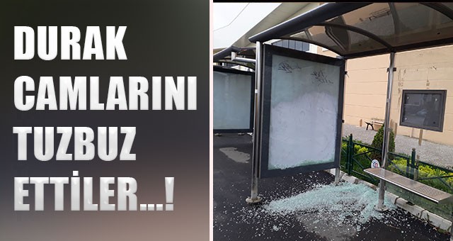 YOLCU DURAKLARININ CAMLARINI KIRDILAR